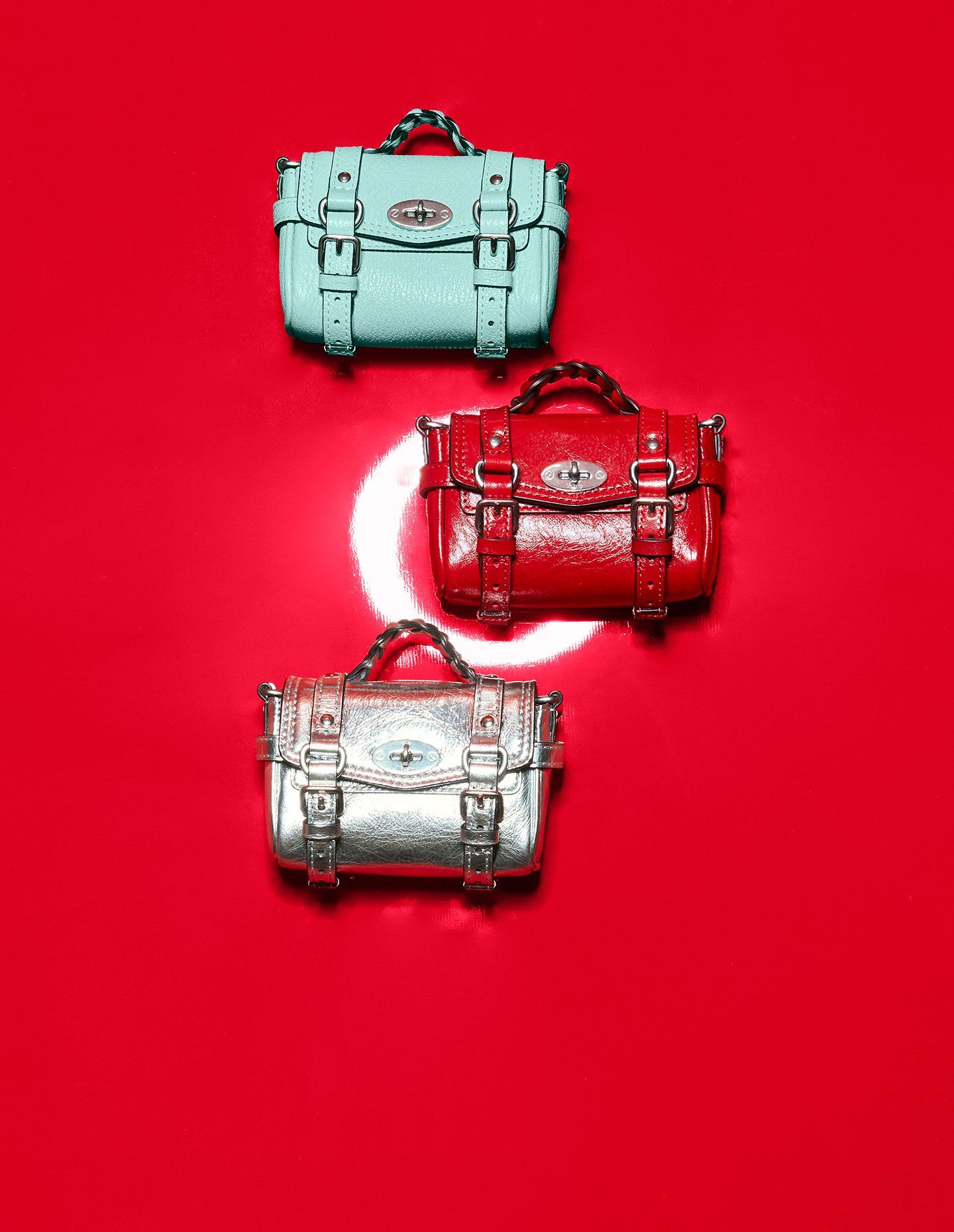 Three Mulberry Alexa micro bags in red, silver and acrylic green